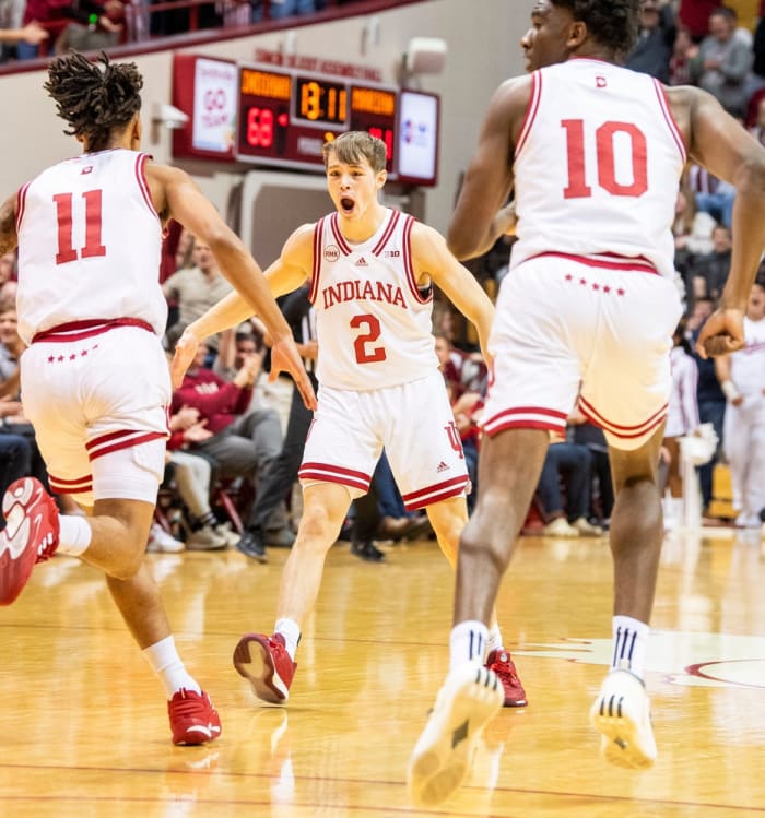 Indiana's Gabe Cupps (2) celebrates with CJ Gunn (11) after his dunk during the second half of the Indiana versus Marian men's basketball game at Simon Skjodt Assembly Hall on Friday, Nov. 3, 2023.